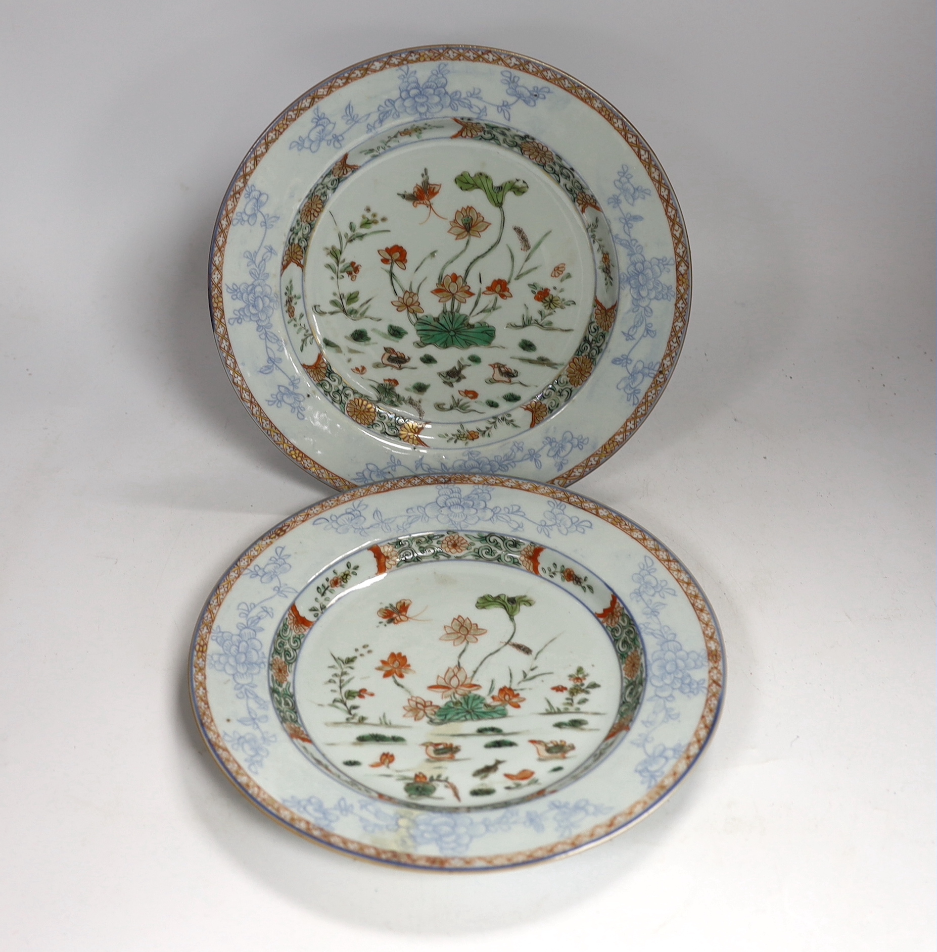 A pair of Chinese famille verte ‘lotus pond’ plates, Kangxi-Yongzheng period, 22.5cm
